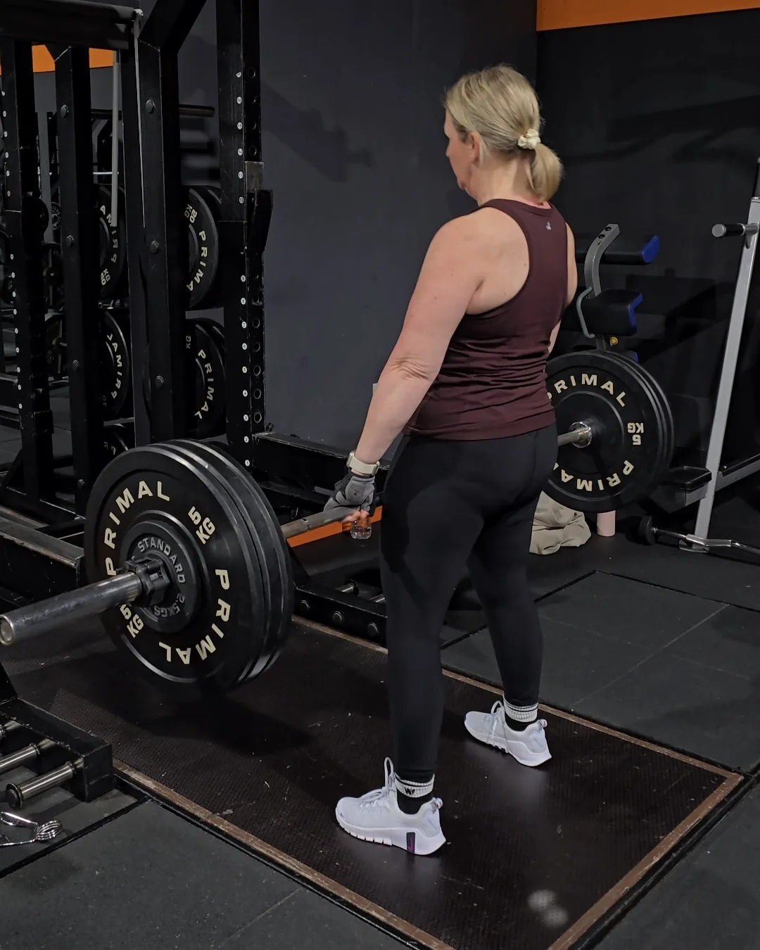 Claire strength-training in the gym